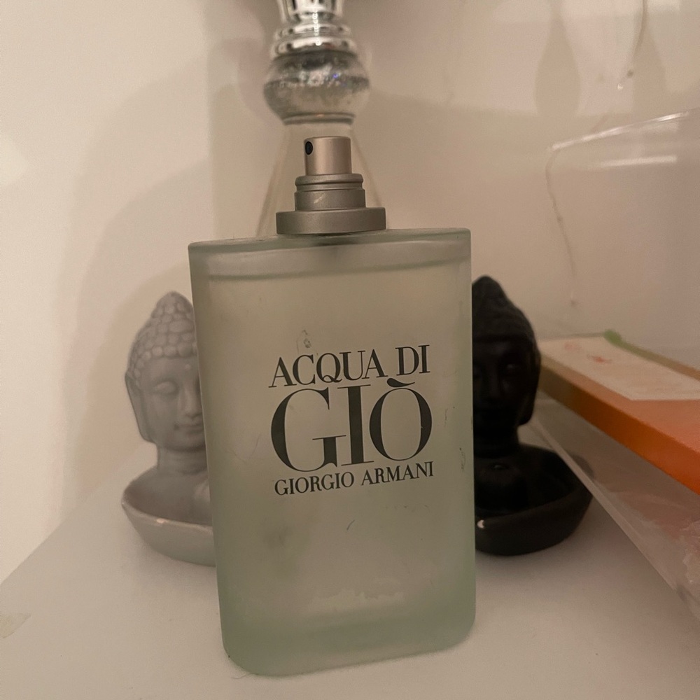 Aqua Di Gio Lightly used 6.7 fl oz. Without top. See line